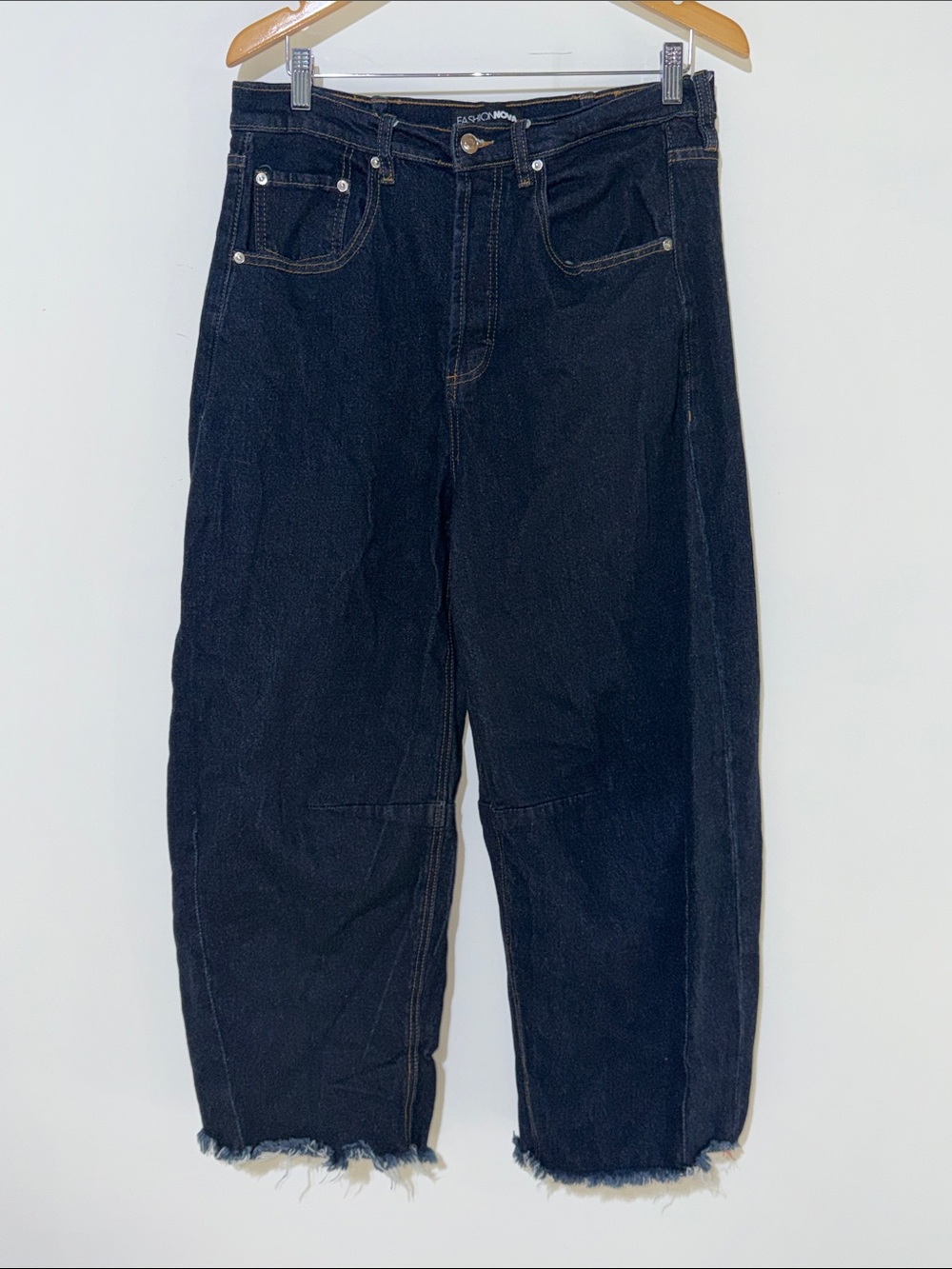 Fashion Nova barrel-leg jeans featuring a raw, frayed hem size 9 dark wash